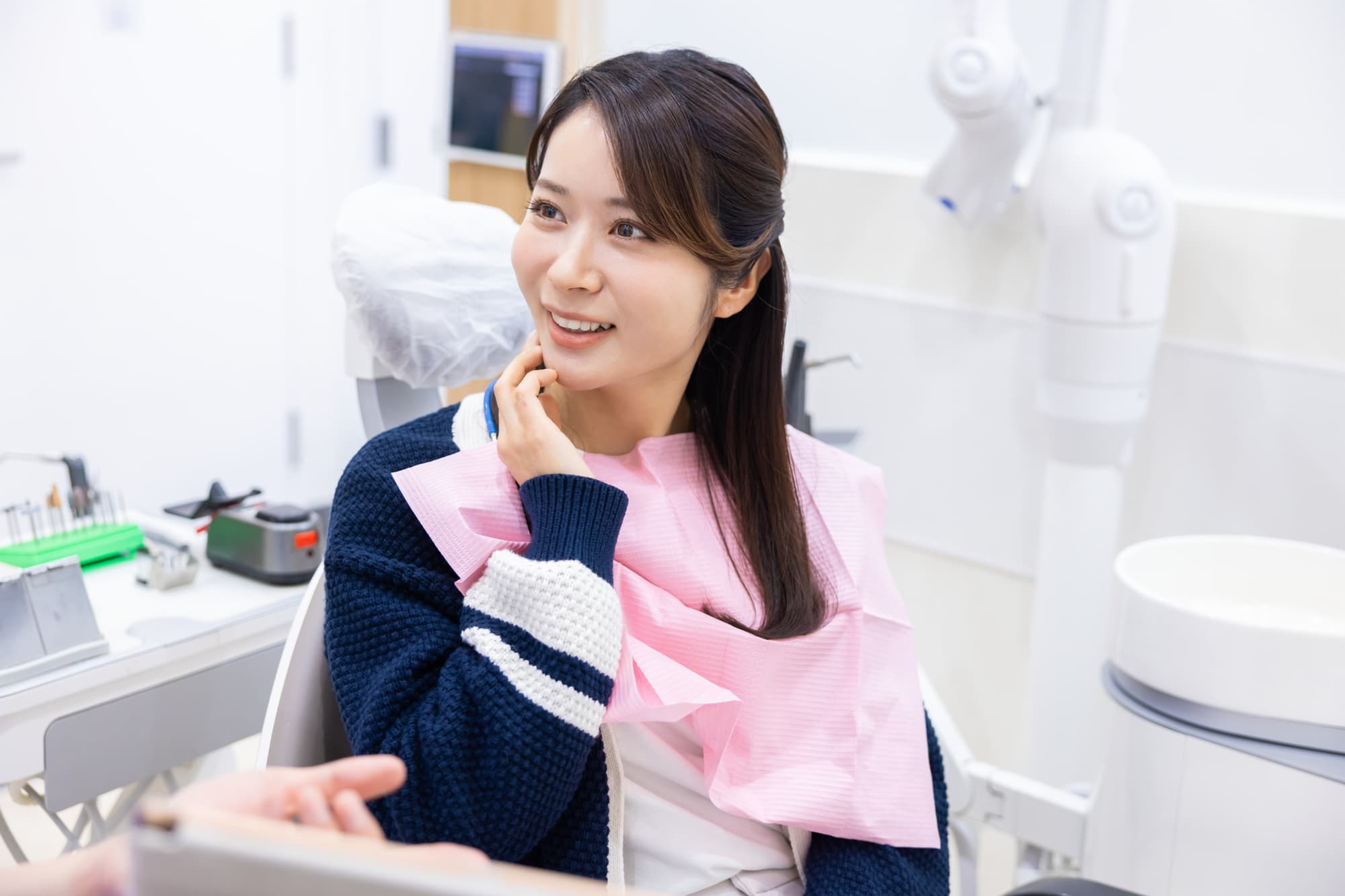 痛みを感じずに根管治療を受けたられた女性