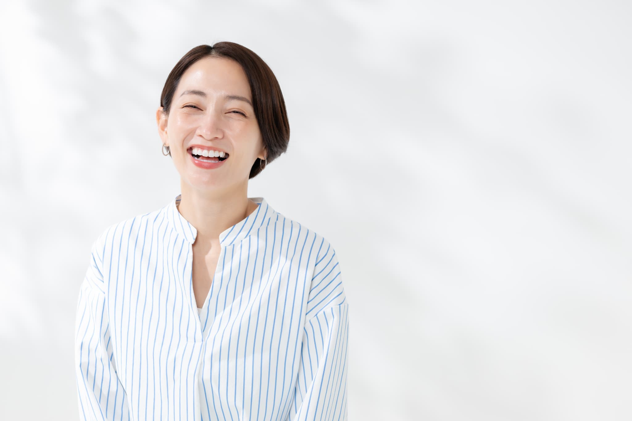 根管治療を終えて笑顔の女性